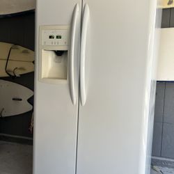 Excellent working counter depth, Frigidaire side-by-side refrigerator freezer