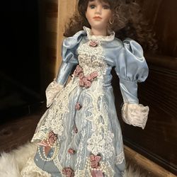 Porcelain Doll With Stand
