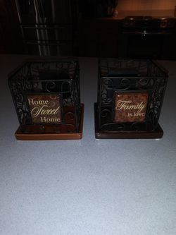 TWO DECROTIVE DOUBLE SIDED CANDLE HOLDERS FROM NEW VIEW
