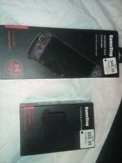 Brand-new in the box handheld switch controller and tv/ charging dock