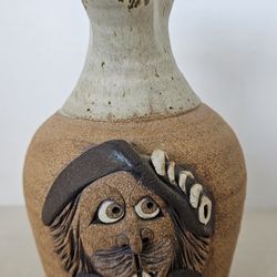 Folk art pottery ugly face jug