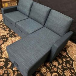 New Navy Blue Sectional Sofabed Couch w/Reversible Chaise & Storage (full retail is $1295 plus tax)