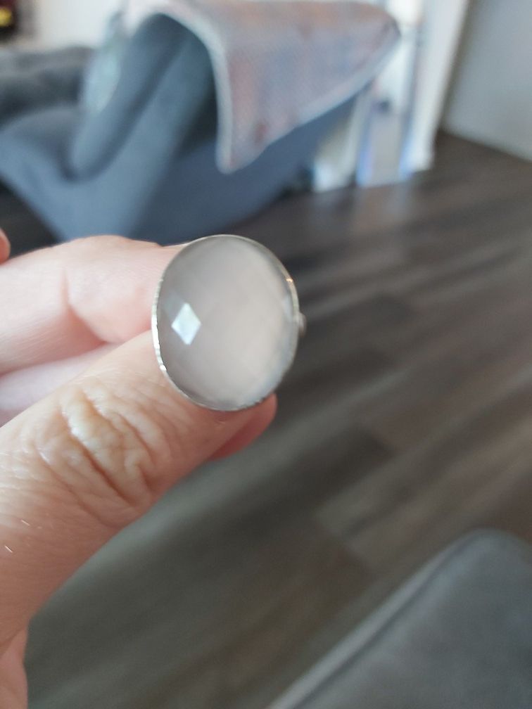 .925 silver rose quartz ring its pink. Looks white in pic