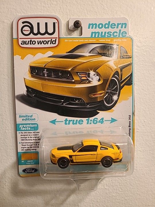 Auto World 2012 Ford Mustang Boss 302 Yellow Blaze w/Black Accents 64502 A 1/64