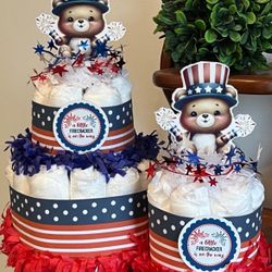 A LITTLE FIRECRACKER is on its way red white blue diaper cakes