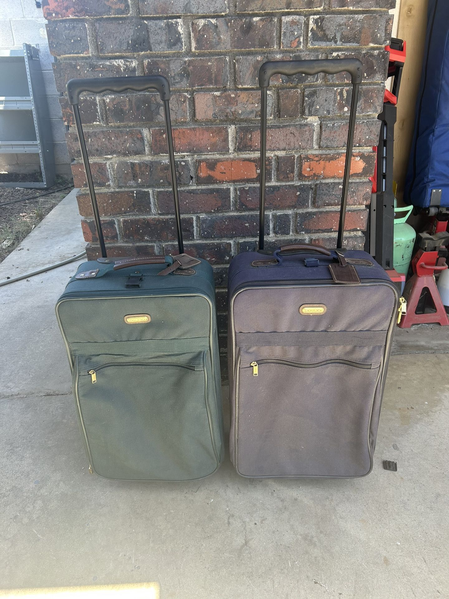 2 Older Suite Cases In Fair Condition