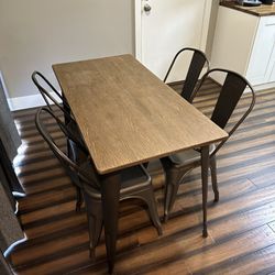 Wooden table and steel chairs - $150