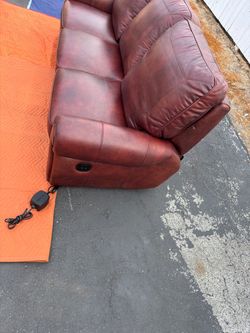 Burgundy OKIN leather couch