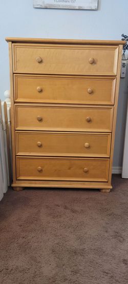5 drawer golden oak colored dresser