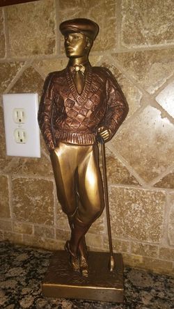 Golfer statue