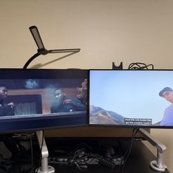 2 - 27” Dell Monitors with Monitors Arms