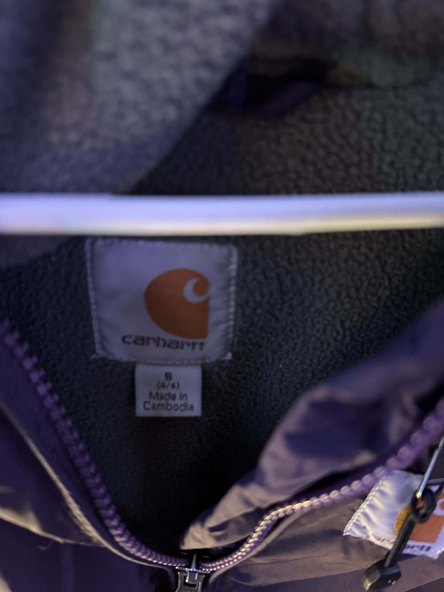 Carhartt jacket, size small (4/6), with a fleece lining, and a hood Purple