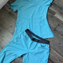 6 scrub sets top and pants . Xs-m