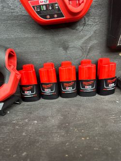 Brand new m12 batterys 40 each brand new and have chargers for 20 each