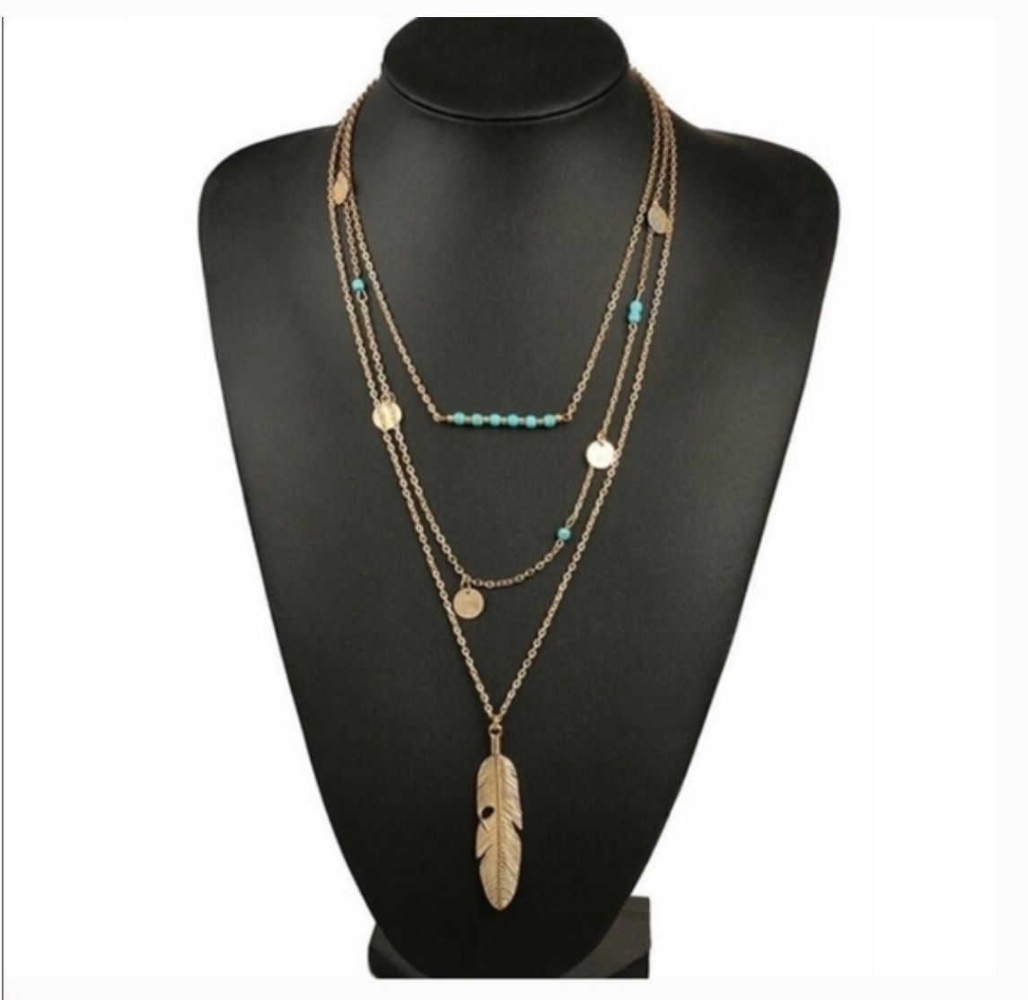 Turquoise Beads, Coins, And Feather