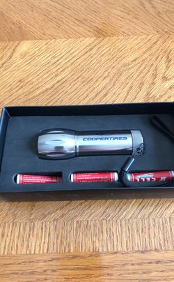 Flash light with Cooper tires logo