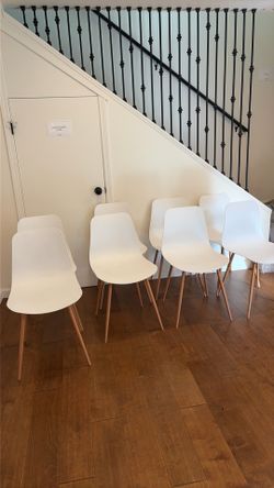 8 dining chairs (sold as a set)
