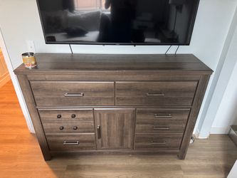 Large Wood-Tone Dresser with Drawers and Cabinet