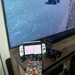 Nintendo switch 64 gig with an extra 512 microSD card Mario deluxe eight I also have a few accessories. 