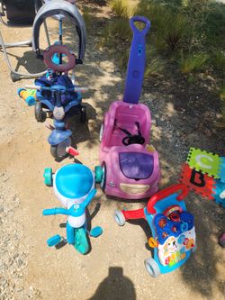 Pink car small bike smart trike and lawnmower bubble toy all for 10$