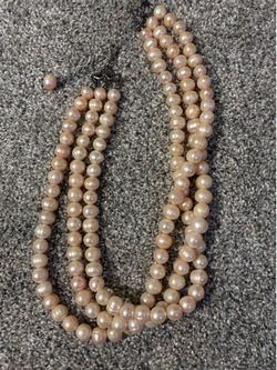 Pink pearl triple strand necklace