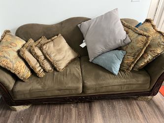 2 antique-style carved-wood sofas