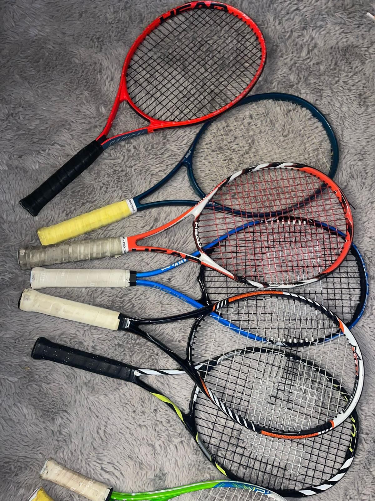 NO SEPARATE 8 used tennis rackets in good condition different colors I do not sell them separately I do not accept offers