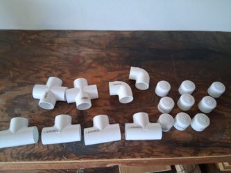 Misc 1 1/4" pvc fittings and caps.  17pc total new