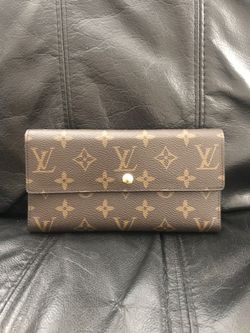Brown trifold Wallet