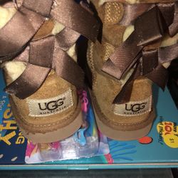 UGG Australia Little Girl Bailey II bow Boots. Size 10C