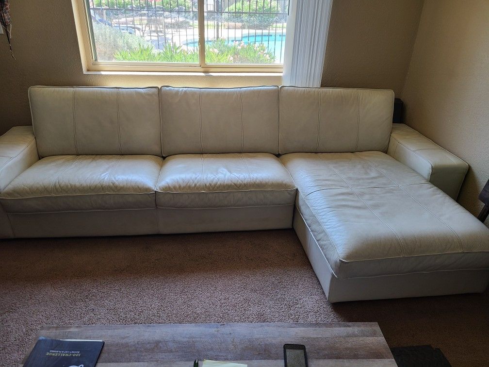 Off white leather lounge couch