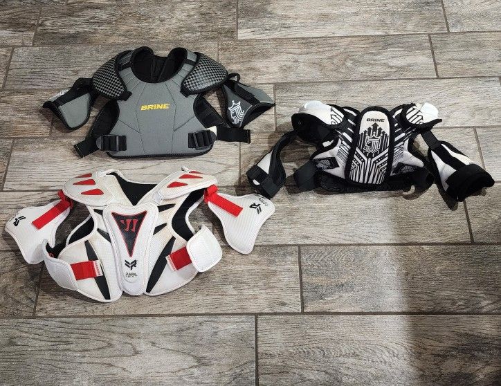 Brine and warrior brand lacrosse shoulder / chest protective pads - Youth size