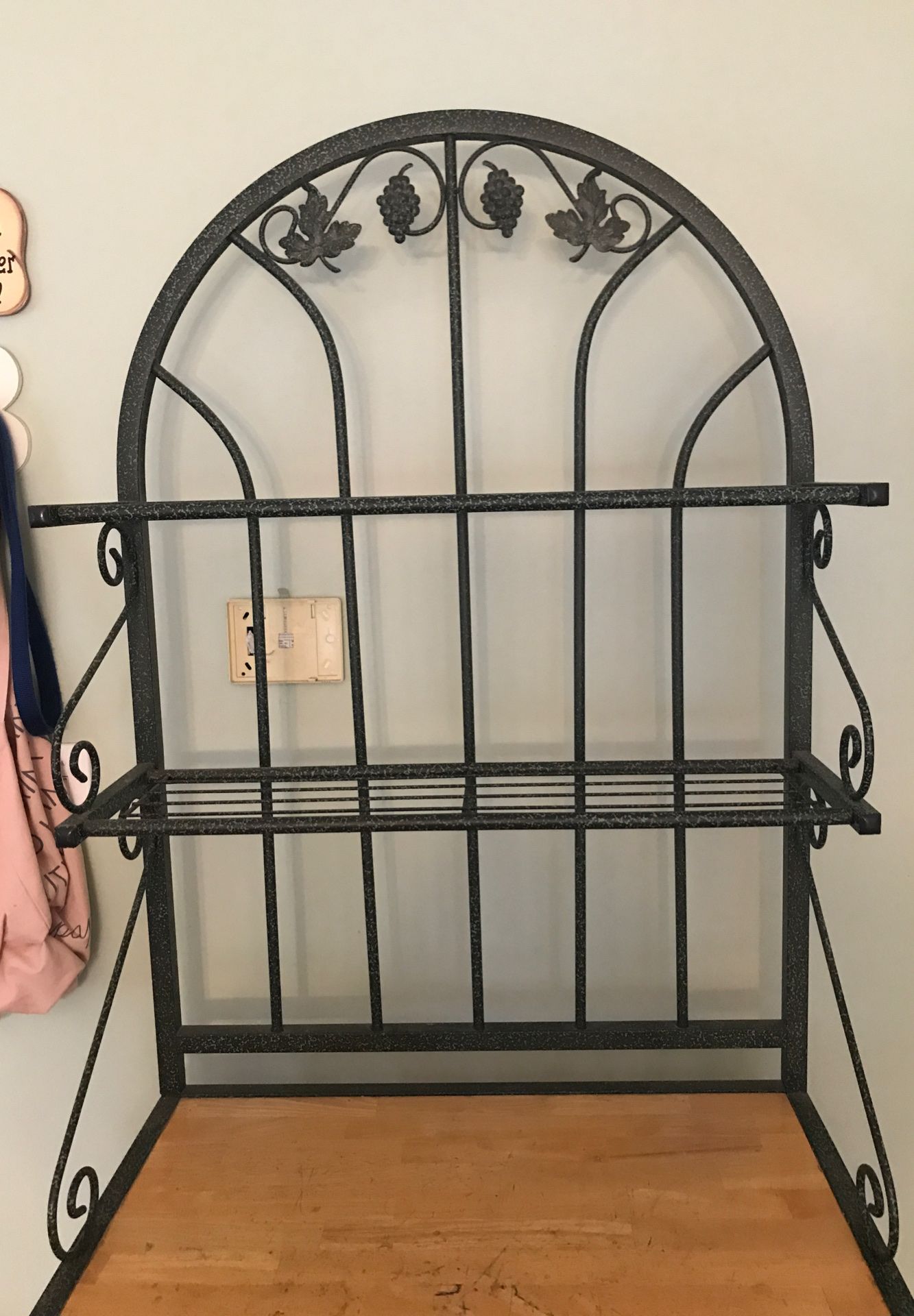 Bakers rack with wine bottle storage