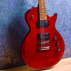Left-Handed Electric Guitar with the Amp