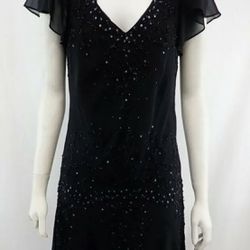 R & M Richards Dress NWOT 6P. Black with beautiful beading and sequins. It has flutter sleeves. The dress is a true black color like in the first 2 pi