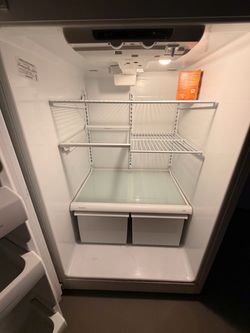 Refrigerator with Wire Shelves and Crisper Drawers