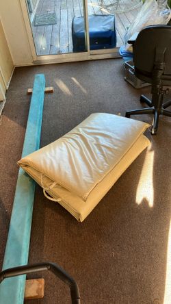 Balance Beam And Gym Mat