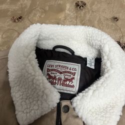 New never used or tried on. Mens size small. Brown Faux Leather  Levi’s jacket.