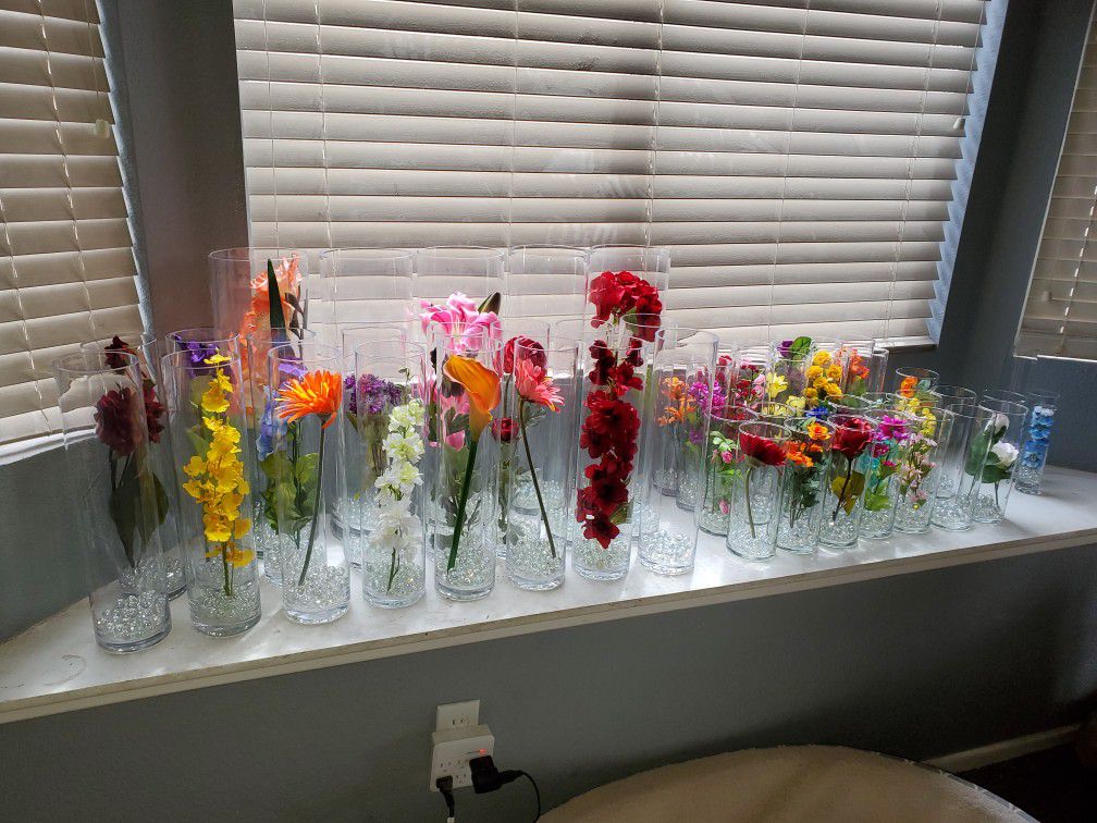 Beautiful glass vases with flowers