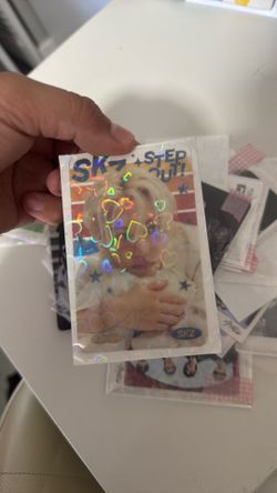 Photo cards and lomo cards of stray kids with a hit tape
