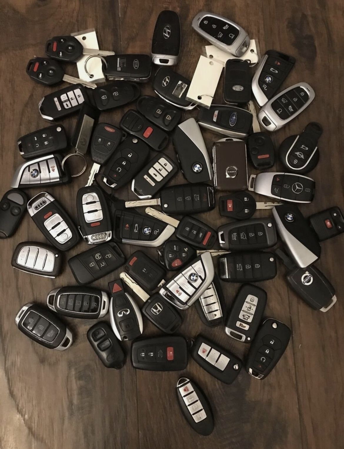 Kia new key fob Toyota key fob Hyundai key fob Mini Cooper key fob Nissan key fob Bentley new key fob Ford key fob Chevrolet key fob Bmw key fob 