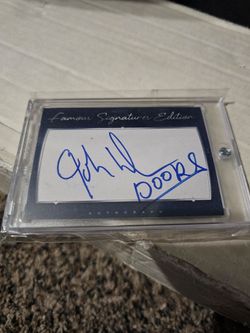 Autograph card by John Densmore from The Doors