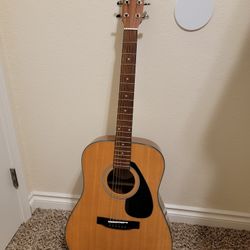 Yamaha Guitar And Rogue Guitar