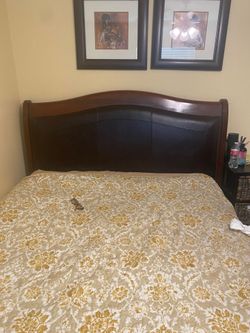 Wood and Leather Upholstered Sleigh Bed