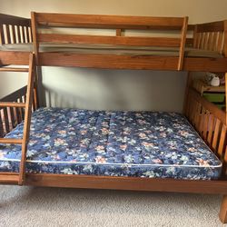 Nice twin over full wooden bunk bed (mattresses included)