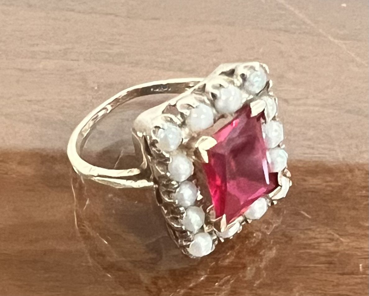 Victorian 10 k Gold Ring. Synthetic ruby Surrounded by (14) 3mm pearls. 4.6 grms