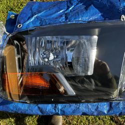 New In Box Dodge Ram Headlight Assembly 