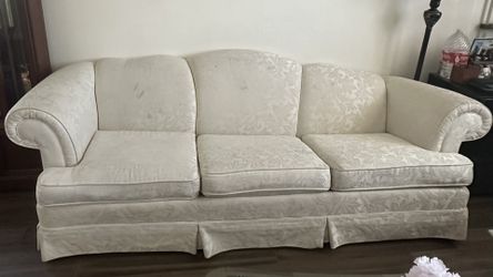 White sofa with floral pattern