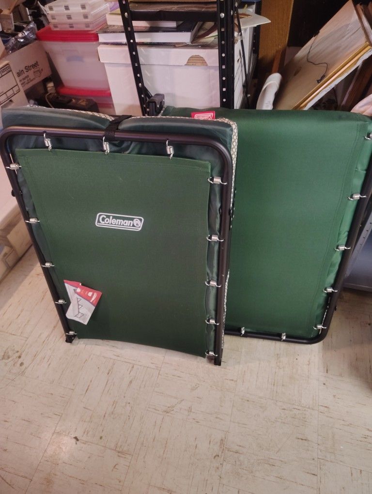 Two Coleman Cots With Pads, Never Used