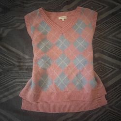 pink and blue vest